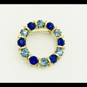 Vintage circle pin - blue rhinestones in gold